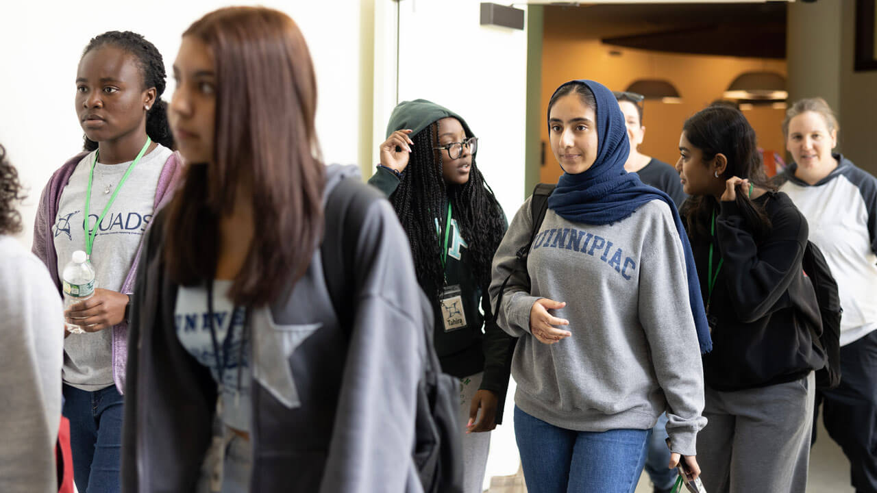 QUADS students walk into the North Haven Campus.